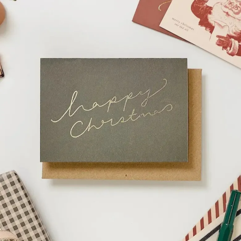Katie Leamon | Tarjeta Navidad Warm Green Happy Xmas